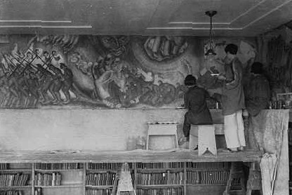 black and white photograph of students working on the Youth Marches On mural